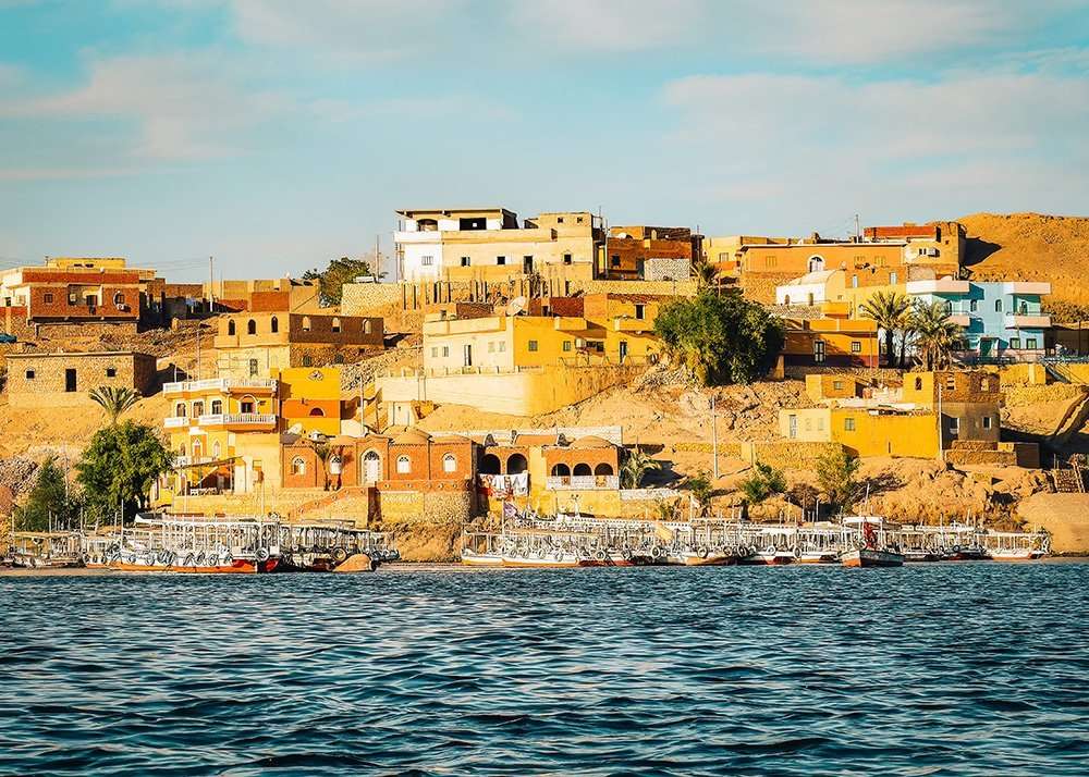 View of Elephantine Island as taken from the Nile River with a part of the river showing on the picture