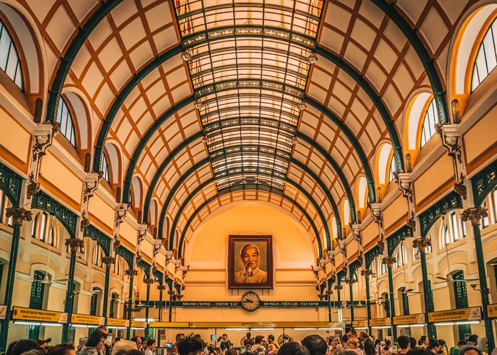 Inside the Central Post Office in Ho Chi Minh City - Vietnam: The grand interior of the Central Post Office, with high ceilings and decorative elements.