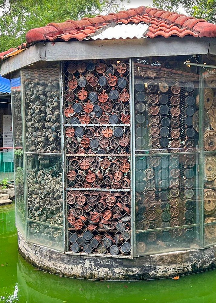 A collection of deactivated landmines and other ordnance displayed at the Cambodia Landmine Museum near Siem Reap. The museum showcases the remnants of past conflicts, educating families about Cambodia’s history and the ongoing efforts for landmine removal.