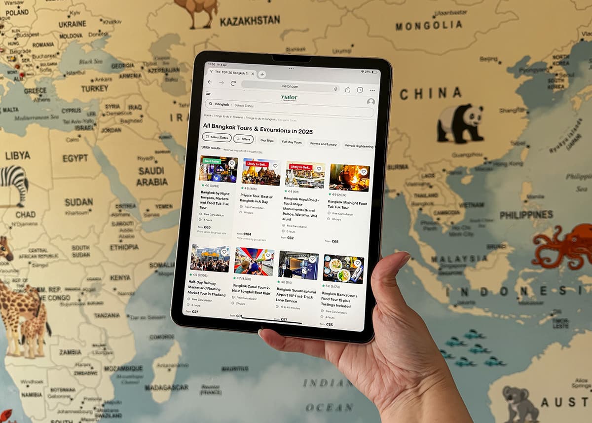 a picture of an ipad with the Viator website open with different ticket options on the screen