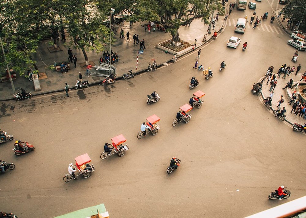 Tuktuks in the streets of Hanoi next to Hoan Kiem Lake