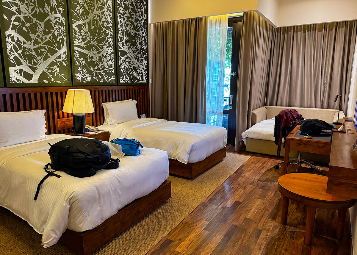 Large luxury hotel room with wooden floors